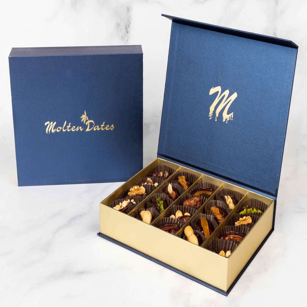 Premium Medjool dates are stuffed with nuts (Pistachios, Almonds, Cashews, Biscuits, and Orange peel) and filled with nuts paste., Meduim