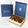 Premium Medjool dates are stuffed with nuts (Pistachios, Almonds, Cashews, Biscuits, and Orange peel) and filled with nuts paste., Meduim view 1
