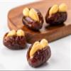 Premium Medjool dates are stuffed with nuts (Pistachios, Almonds, Cashews, Biscuits, and Orange peel) and filled with nuts paste., Meduim view 3