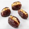 Premium Medjool dates are stuffed with nuts (Pistachios, Almonds, Cashews, Biscuits, and Orange peel) and filled with nuts paste., Meduim view 4