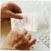 FOMIYES 100pcs Writable Pill Bags Travel Medicine Packets for Easy Organization and Secure Storage of Medications view 2