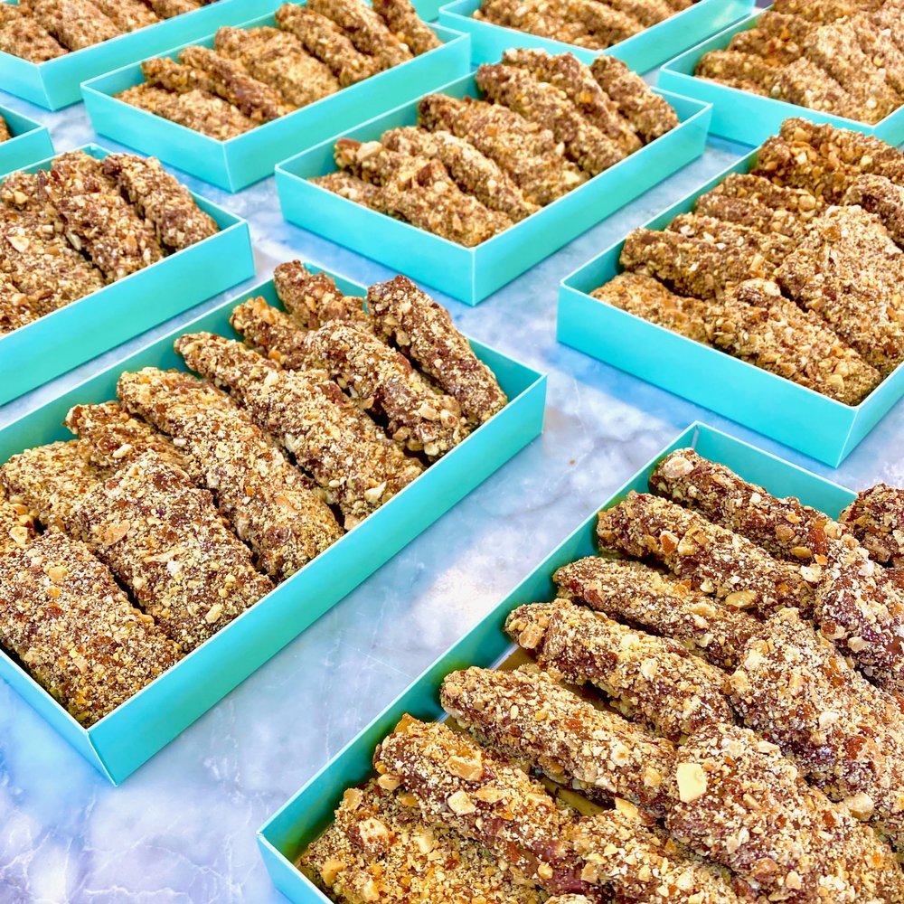 6 Boxes of Gourmet English Toffee Candy Sticks - English toffee doused in gourmet milk chocolate and rolled in crushed roasted almonds. Each box is packed in our 1 LB fancy candy box