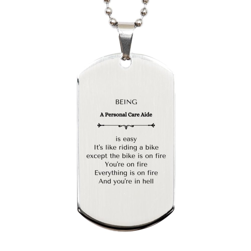 Gag Personal Care Aide Gifts, Sarcasm Silver Dog Tag for Personal Care Aide Birthday Graduation Gifts for Men Women Being Personal Care Aide is easy. It's like riding a bike except the bike is on