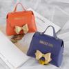 10 Pack PU Leather Bowknot Gift Boxes 5 x3.5 Inch Reusable Candy Gift Favor Boxes with Bow Mini Bowknot Handbag Purse Gift Bags with Handles for Wedding Baby Shower Birthday Christmas Party Favor Bag (Navy Blue) view 3