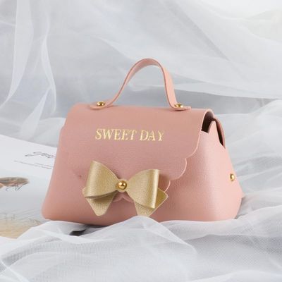 10 Pack PU Leather Bowknot Gift Boxes 5 x3.5 Inch Reusable Candy Gift Favor Boxes with Bow Mini Bowknot Handbag Purse Gift Bags with Handles for Wedding Baby Shower Birthday Christmas Party Favor Bag (Pink)
