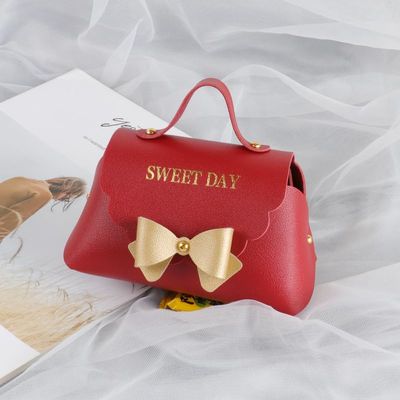 10 Pack PU Leather Bowknot Gift Boxes 5 x3.5 Inch Reusable Candy Gift Favor Boxes with Bow Mini Bowknot Handbag Purse Gift Bags with Handles for Wedding Baby Shower Birthday Christmas Party Favor Bag (Red)