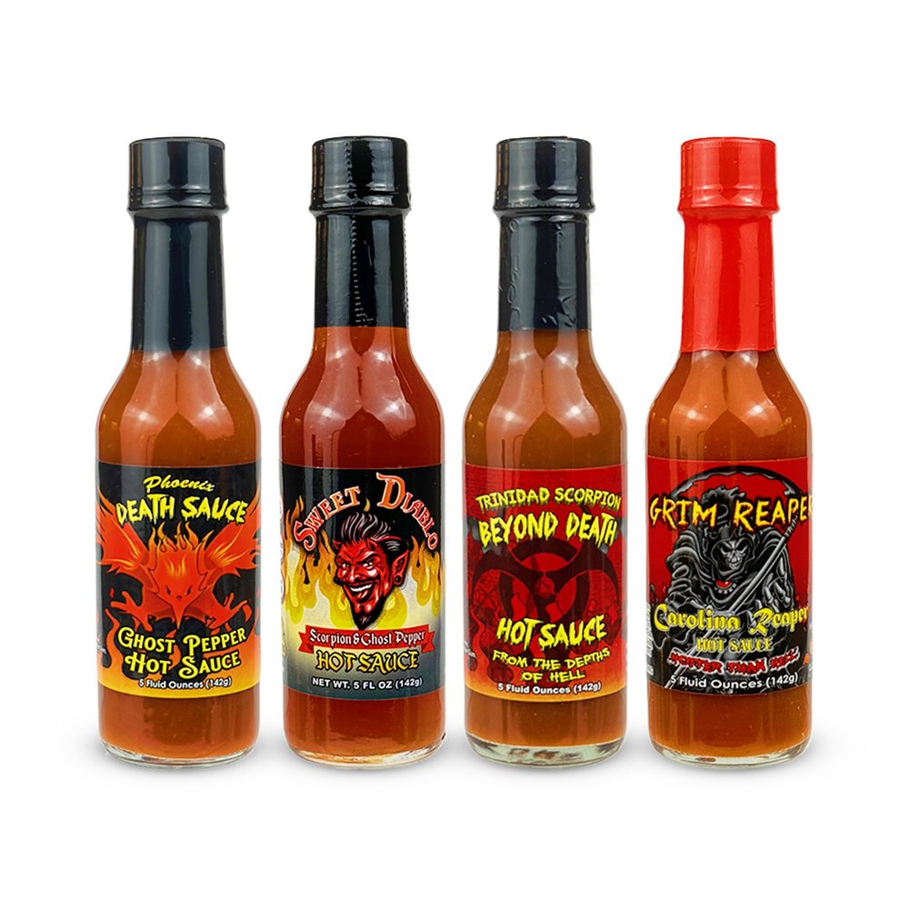 Anthony Spices - Hot Sauce 4-Pack. Includes Carolina Grim Reaper Hot Sauce, Phoenix Death Sauce, Sweet Diablo Sauce and Trinidad Scorpion Beyond Death Sauce.