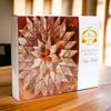 Ghasitaram Gifts Jaiccha Rakhi Gifts for Brothers-Orange Hamper Box with Kaju Katli, Choco Almonds, and Flavour Raisins with 2 Rakhis view 2