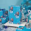 LeZakaa Funny Christmas Wrapping Paper Roll, Santa Claus Riding a Fierce Shark, Blue Xmas Playful Design for White Elephant, Gag Gifts, and Cool Holiday Presents, Mini Roll 17 in x 16.4 Feet view 3