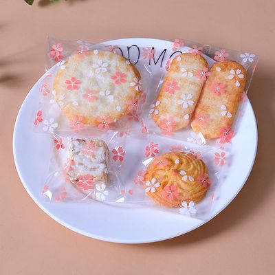 100 Pcs Cookie Packaging Bags, Cherry Blossom PrintingSliced Bread, Donut Packaging, Transparent Self-sealing Cellophane, OPP Packaging, Gift Packaging Bags (2.82.8 inches)