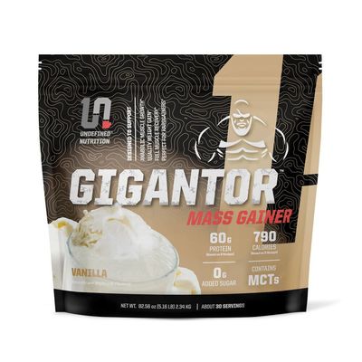 Undefined Nutrition Gigantor Mass Gainer by Brian Shaw (60g Protein, 30 Servings, up to 790 Quality Calories) Hardcore Hard Gainer Formula with 5- Phase Protein Blend (5.16 lbs, Vanilla)