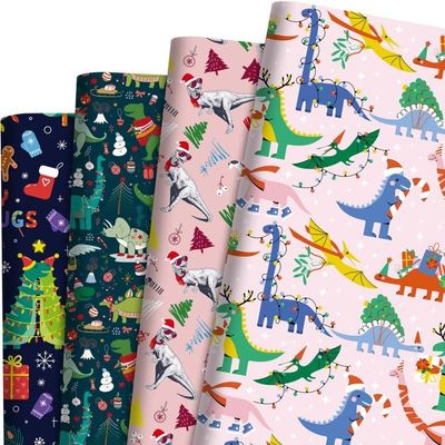 Sanixin 12 Sheets Dinosaur Wrapping Paper Dinosaur Christmas Hat Xmas Tree Candy Cane Snowflake Printed for Christmas Holiday Baby Shower Dinosaur Gift Wrap,19.7 x 27.6 Inches (Xmas Dinosaur)