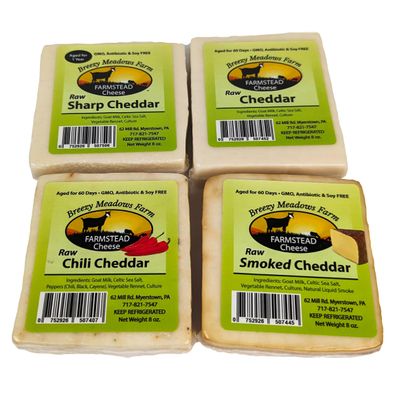 Breezy Meadows Farm Raw Sharp Cheddar (8 oz), Raw Cheddar (8 oz), Raw Chili Cheddar (8 oz) and Raw Smoked Cheddar (8 oz)