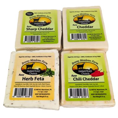 Breezy Meadow Farms Raw Sharp Cheddar (2 x 8 oz), Raw Cheddar (2 x 8 oz), Raw Herb Feta (2 x 8 oz), and Raw Chili Cheddar (2 x 8 oz)