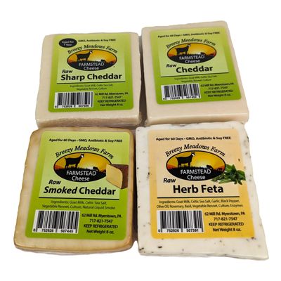 Breezy Meadows Farm Raw Sharp Cheddar (8 oz), Raw Cheddar (8 oz), Raw Smoked Cheddar (8 oz), and Raw Herb Feta (8 oz)