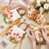 NBEADS 10 Pcs Floral Small Gift Bags with Handles, Flower Drawstring Bags Tea Party Favor Bags Velvet Small Bag for Wedding Birthday Bridal Shower Tea Party, Sandy Brown, 6.9x5.3Inch view 3
