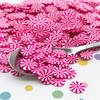 10mm Hot Pink Peppermint Polymer Clay Candy Slices, Faux Dessert Sprinkles, Nail Art Miniature Slices - Non Edible (30 gram bag) view 1