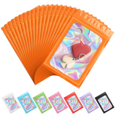 ANZNKU 100 Pack Mylar Bags Reasealable Holographic Bags, Smell Proof Bag Zipper Pouches with Clear Window, Jewelry Candy Sealable Goodie Bag for Packaging Sample Party Favor (Orange, 7.1 x 10.2 Inch)