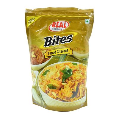 Real Namkeen Papad Chavana Snack Mix.Real Namkeen Bites Papad Chavana is a crunchy, spicy mix of papad pieces and savory ingredients, perfect for a flavorful snacking experience.
