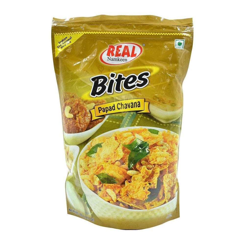 Real Namkeen Papad Chavana Snack Mix.Real Namkeen Bites Papad Chavana is a crunchy, spicy mix of papad pieces and savory ingredients, perfect for a flavorful snacking experience.
