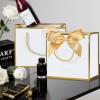 SHIPKEY 10 PCS White Gift Bags (GoldTrim), 7.4"x2.8"x5.9" Small Welcome Bag, Luxury Shopping Bags with Ribbon Handle and Bows (18.8x7x14.8cm) view 3