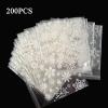 200PCS Cookie Bags for Packaging, 5.5"x5.5" Inches Self Sealing Snowflake Cellophane Bags, Self Adhesive Christmas Treat Bag for Xmas Gift Giving Wrappers, Party Favors view 2