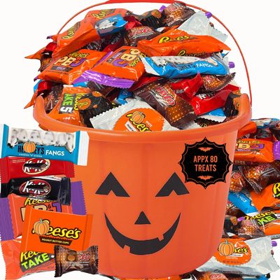 Halloween Chocolate Assortment in Jack O Lantern Pumpkin Bucket, Spooky Party Favor Bulk Candy Gift, Includes Assorted Individually Wrapped Milk Chocolate Trick or Treat Bars