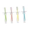 HAKIDZEL 4pcs Silicone Toothbrush with Suction Base for Teeth Training Soft Bristles Teether for Gentle Gum Care Standing Design for Easy Storage Blue Pink Green Yellow view 1
