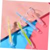 GANAZONO 4pcs Silicone Toothbrush with Suction Standable Base Soft Bristles Training Brush for Gum Relief Safe Chewing Teether in Blue Pink Green Yellow view 4