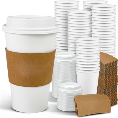 10 oz White Paper Hot Cups with Dome Lids and Sleeves with FREE BONUS Stirrers Disposable To Go Coffee Cups with Travel Lids Ideal for Latte Cappuccino Tea & Chocolate (100 Sets)