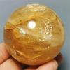 PPOZYLPC 1pc 100-200g Golden Healer Fire Hematoid Crystal Ball Orbit Statue view 2