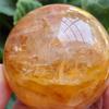 PPOZYLPC 1pc 100-200g Golden Healer Fire Hematoid Crystal Ball Orbit Statue view 4