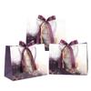 DONQE Paper Gift Bags with Handles and Bow Ribbon, 3PCS 9.847.874.72In Goodie Bags Bulk, Reusable Party Favor Bags for Birthday Wedding Valentine's Day, Mother's Day view 1