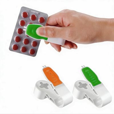 2nd Generation Pill Extractor Tool with Storage Compartment, Medicine Blister Pack Remover, Dual Tooth Design for Foil Piercing, Built-in Organizer Box,(Orange and Green) 2 pcs
