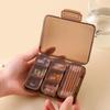 Healvian Portable 7-Day Pill Organizer Box, Compact Travel Medicine Case with Sealed Compartments, Mini Weekly Pill Storage Container for Daily Vitamins and Medication (Brown) view 3