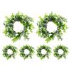 FUNOMOCYA 6pcs Eucalyptus Leaves Ring Candle Centerpiece with Flexible Styling and Realistic Design, Green Decorative Leaf Wreath for DIY Decorative Needs and Chair Dcor, 10 Inch Artificial view 1