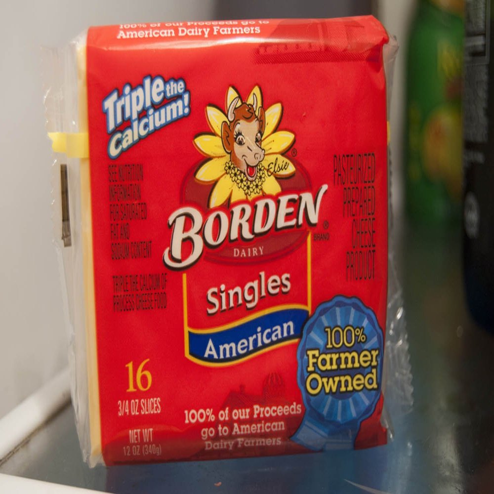 BORDEN CHEESE SLICES AMERICAN SINGLES 12 OZ PACK OF 3