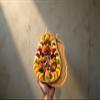 A Gift Inside Festive Dried Fruit and Nuts on Bamboo Pear Shaped Cutting Board view 4